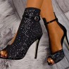 Black glitter ankle high heels - with an ankle strap - half open designHigh heels