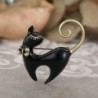 Retro enamel black / white cat brooch