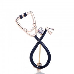 Stethoscope shaped brooch with crystal