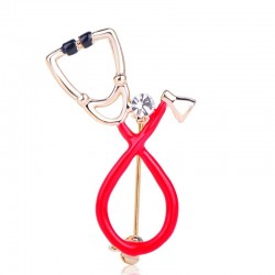 Stethoscope shaped brooch with crystalBrooches