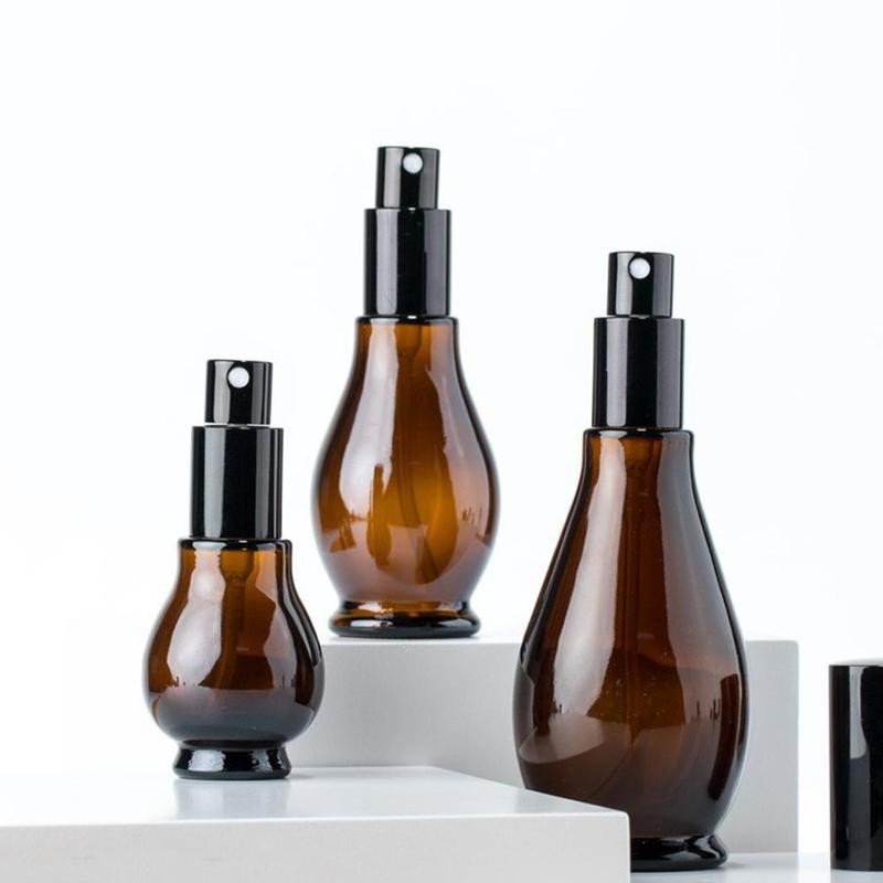 Sprayflaska i glas - mörkbrun - solskydd - kosmetika / parfymprovbehållare