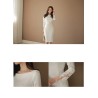 Varm elegant klänning - med spetsärmar - vit