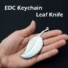 Mini fickkniv - hopfällbar - med nyckelring - rostfritt stål - bladform