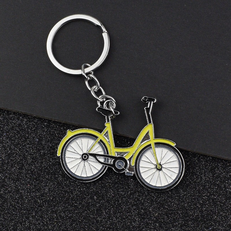 Gul cykel - metall nyckelring