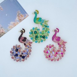 Crystal peacock broochBrooches