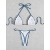 Sexig bikiniset - med metalldekorationer