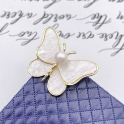 White shell butterfly - with a pearl - broochBrooches