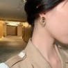 Eleganta gyllene runda örhängen - flera cirklar