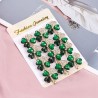 Fyra kristallgröna blad - brosch - 12 stycken set
