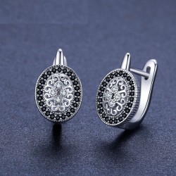 Eleganta runda silverörhängen - vita/svarta kristaller