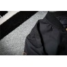 Black bomber jacka med broderade gyllene vingar