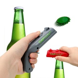 Cap gun - bottle opener - shoots the cap awayBar supply