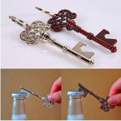 Nyckelformad flasköppnare med keyring